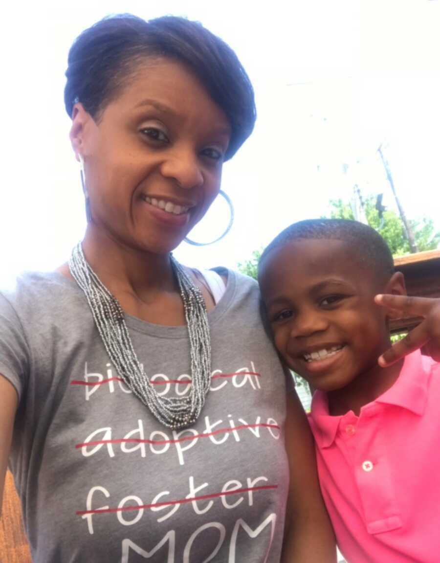 Mik and Dwayne take a picture together as mother and son.